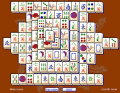 Match tiles in puzzle game Mahjong Solitaire.